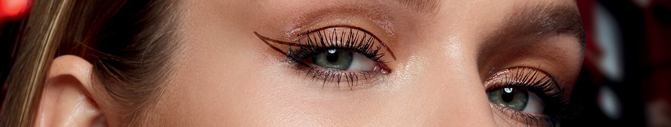 Maybelline Eyeliner products illustrative banner image - Close up of a woman wearing graphic Eyeliner