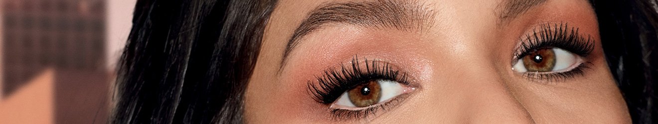 Maybelline Mascara products illustrative banner image - Close up of a woman's Eyes, with mascara